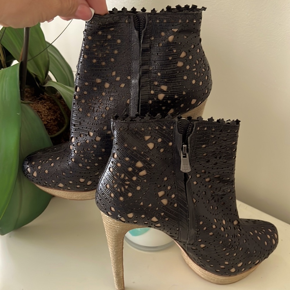 BCBG MaXAzria stamped leather upper booties